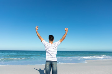 Young man relaxing at the beach