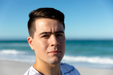 Portrait of young man at the beach