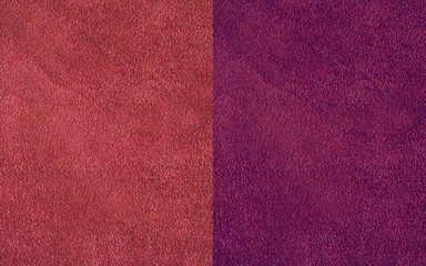 The texture of natural suede. Purple background of leather material.