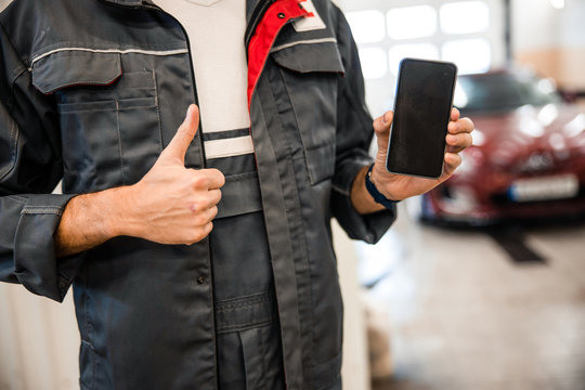 Young man bragging about his mobile phone
