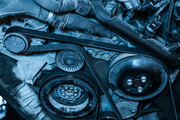 Car engine repair. Generator belt.