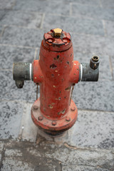 Red Fire Hydrant on Paved Street