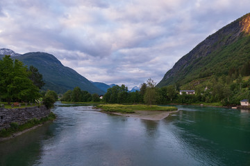 Small Norwegian town Stryn on river bank. July 2019