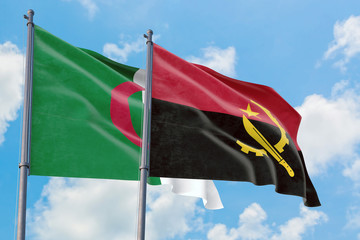 Angola and Algeria flags waving in the wind against white cloudy blue sky together. Diplomacy...