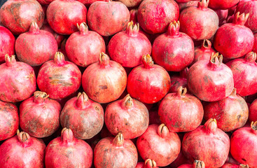 Background from red fresh pomegranate fruits