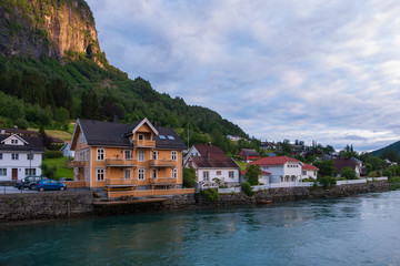 Small Norwegian town Stryn on river bank. July 2019