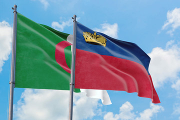 Liechtenstein and Algeria flags waving in the wind against white cloudy blue sky together. Diplomacy concept, international relations.