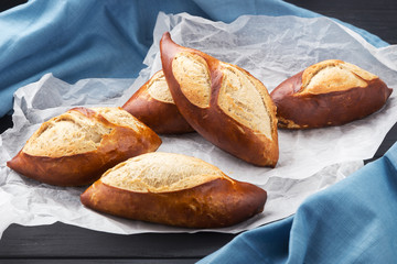 Fresh bread, buns ready to be used. Fresh homemade baked bread, bun on the board. Buns - freshly baked tasty pastries, menu concept. food background.