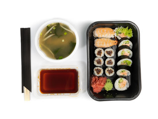 Plastic container with sushi set ready for takeout delivery