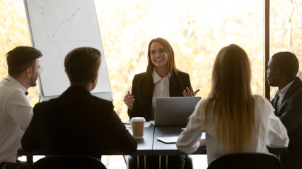 Investors listen female company representative giving presentation makes offer