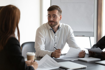 Business entities discuss contract terms take part in formal negotiations