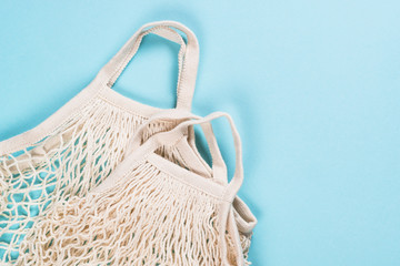 Mesh bag for zero waste shopping on color background.