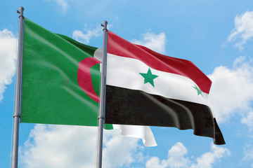 Syria and Algeria flags waving in the wind against white cloudy blue sky together. Diplomacy concept, international relations.