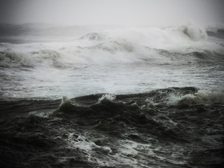 Crashing big sea waves. Gloria storm on the Barcelona coast. The power of the sea.