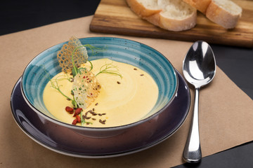 Delicious cream soup. Homemade creamy cheese soup. Potato and chicken cream soup.