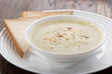 Delicious cream soup. Homemade creamy cheese soup. Potato and chicken cream soup.
