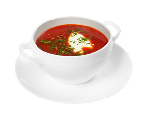 Borscht in a bowl on white background