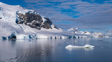 Navigating through breathtaking coastal landscapes along  the Antarctic continent