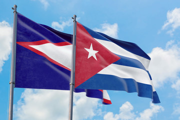 Cuba and American Samoa flags waving in the wind against white cloudy blue sky together. Diplomacy concept, international relations.