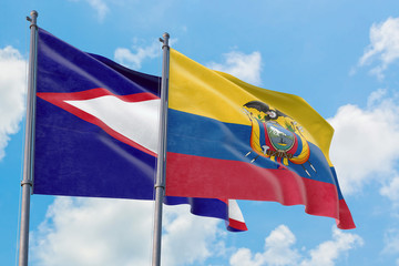 Ecuador and American Samoa flags waving in the wind against white cloudy blue sky together. Diplomacy concept, international relations.