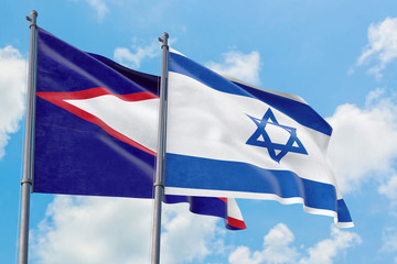 Israel and American Samoa flags waving in the wind against white cloudy blue sky together....