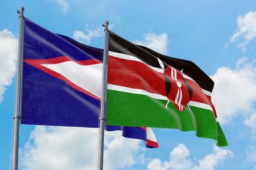 Kenya and American Samoa flags waving in the wind against white cloudy blue sky together. Diplomacy concept, international relations.