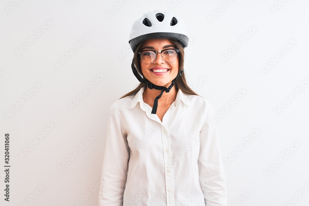 Wall mural Beautiful businesswoman wearing glasses and bike helmet over isolated white background with a happy and cool smile on face. Lucky person.