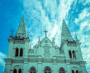 A low angle front shot of exteriors of Santa Cruz Basilica in Kochi