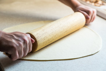 Pizza making process. Chef preparing Italian pizza. Pizza Art. The process of making pizza. Close up view. Space for text 