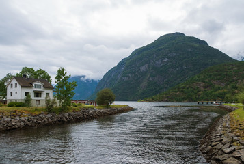 Obraz premium Hellesylt, small village in Norway located close to Geiranger Fjord. July 2019