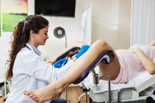 Australian Gyno Porn - Young pregnant woman lying in gynecological chair during gynecological exam.  Stock Photo | Adobe Stock