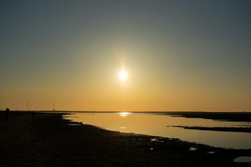 Obraz premium Sunset on a beach in Noordwijk aan zee, Netherlands