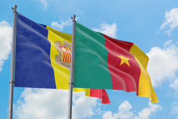Cameroon and Andorra flags waving in the wind against white cloudy blue sky together. Diplomacy concept, international relations.
