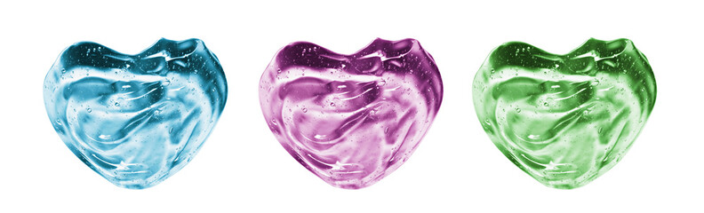 Cosmetic clear gel texture. Colored transparent heart shaped swatches isolated on white background. Pink, blue, green liquid skincare product smudge smear with bubbles closeup