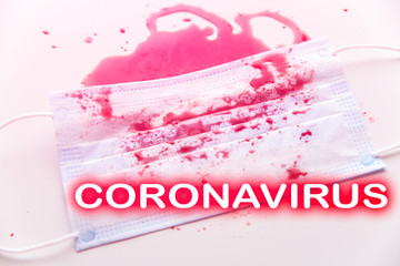 Medical mask with blood stain. Coronavirus problem. Lung disease and bronchitis. Cough effect....