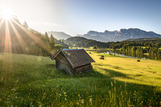 Idyllic alpine hut at sunrise in Bavaria, Allgäu, Germany