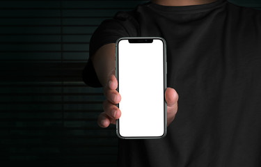 Blank white screen of phone holding by man 