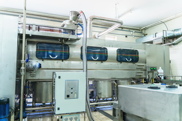 Industrial equipment, part of automatic conveyor belt in beverage factory, toned