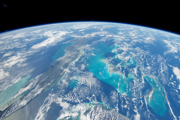 Earth atmosphere from space Elements of this image were furnished by NASA.