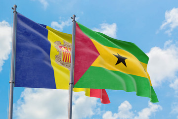 Sao Tome And Principe and Andorra flags waving in the wind against white cloudy blue sky together. Diplomacy concept, international relations.