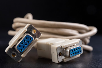 Old computer cable for transferring digital data. Computer accessories.
