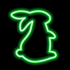 Green neon sign sitting rabbit on black background