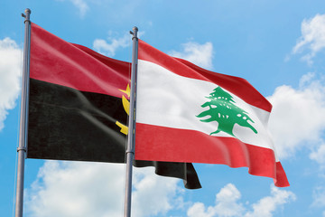 Lebanon and Angola flags waving in the wind against white cloudy blue sky together. Diplomacy concept, international relations.