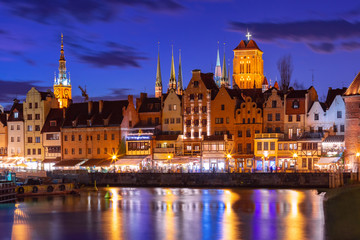Fototapeta na wymiar Old Town of Gdansk, Dlugie Pobrzeze, Bazylika Mariacka or St Mary Church, City hall and Motlawa River at night, Poland