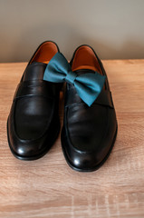 Black man shoes and tiebow