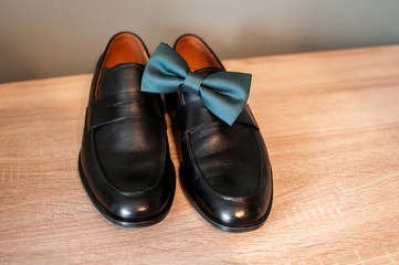 Black man shoes and tiebow