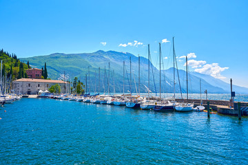 Naklejka premium Pier near Lake Garda. Riva del Garda, Italy.