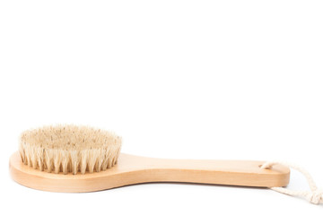 Closeup of cactus fiber body brush isolated on a white background. Natural, plastic free beauty tool. Bath and home self care concept. Flat lay, top view. Copy space for your text