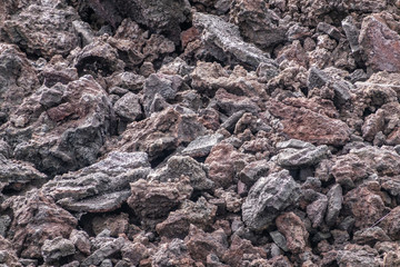 Leilani Estate, Hawaii, USA. - January 14, 2020: 2018 Kilauea volcano eruption hardened black lava field. Closeup of smaller rocks and pebbles on top.