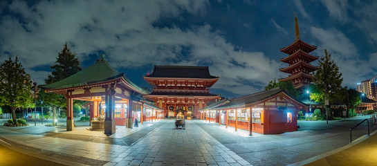 Japan. Asakusa Temple in Tokyo at night.  Panorama of Asakusa district. Night panorama of the temple of the three deities. Evening Tokyo. Sights of Japan. Tub of water in front of Sensoji Temple